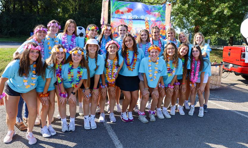 Students participate in homecoming parade